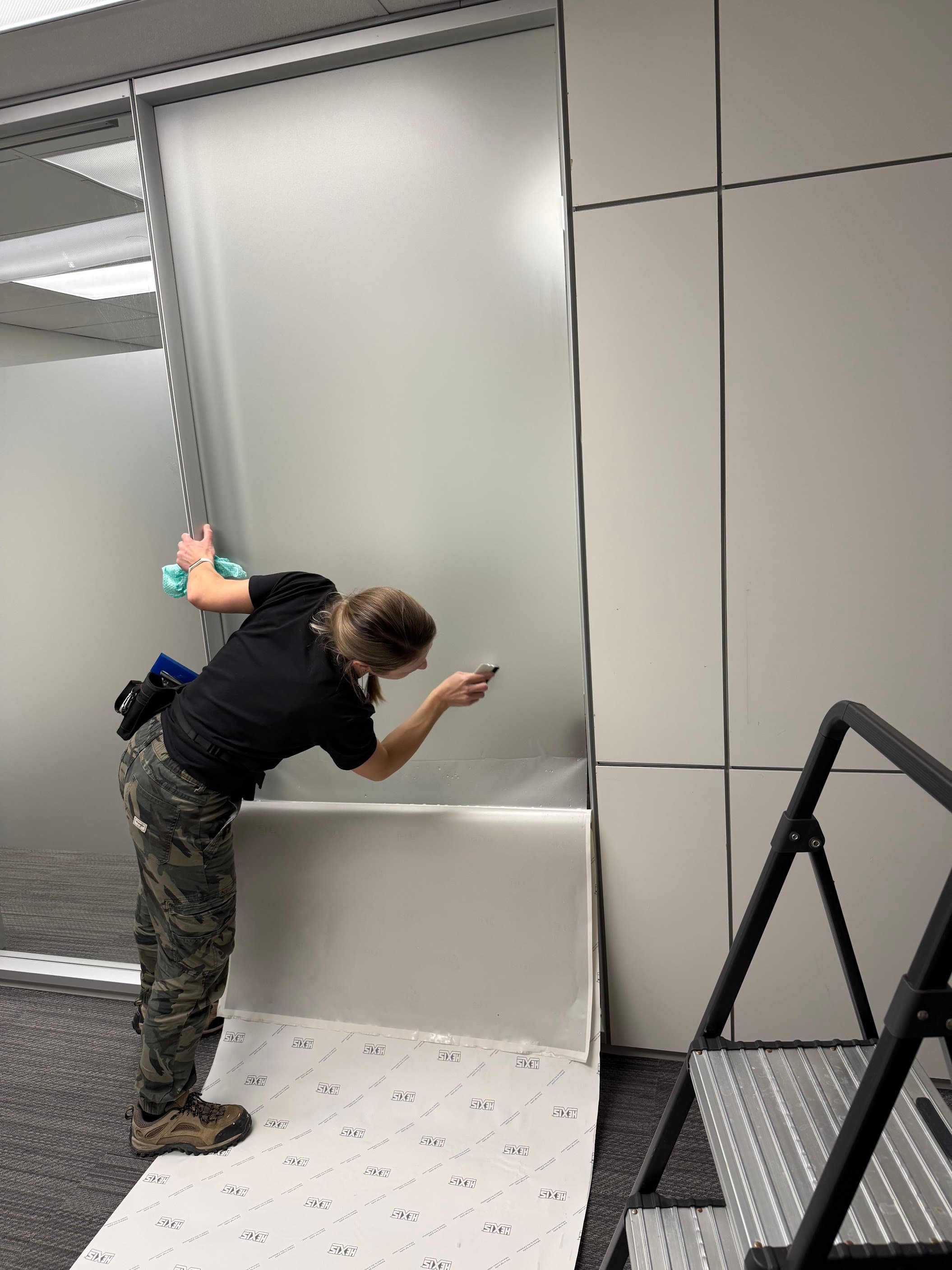 Frosted privacy film installed on office glass at a Beltline office in Calgary