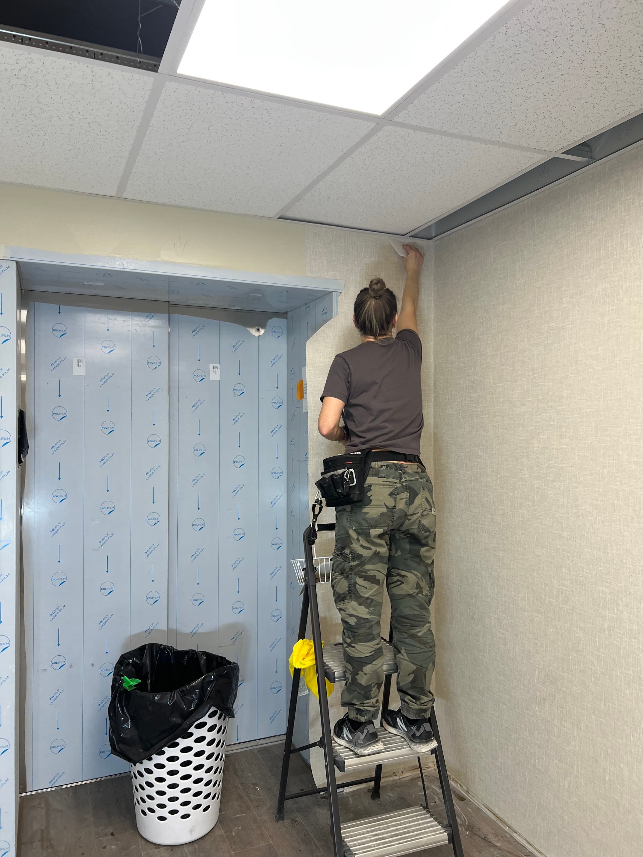Commercial wallcovering installation at a Chestermere senior living community