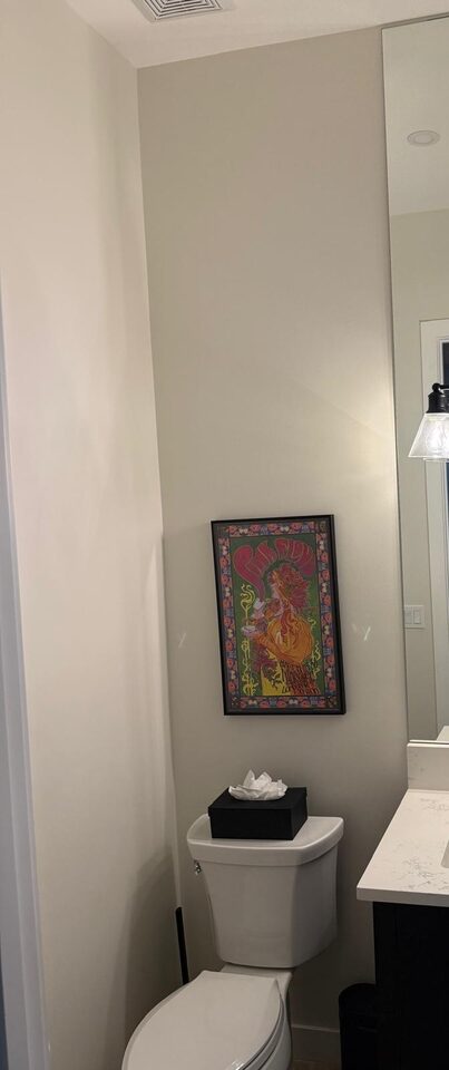 Altadore, Calgary powder room before wallpaper, with plain painted walls above the toilet