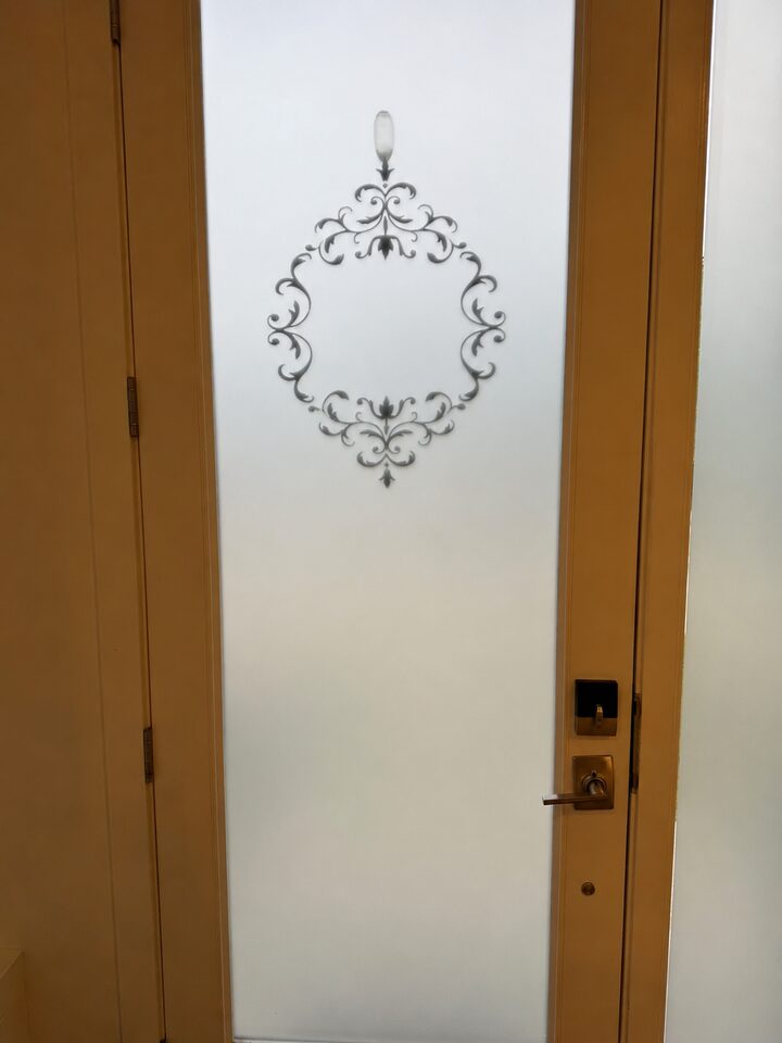 Metamark Silver Etch frosted privacy window film replacement on a front entry door in Capitol Hill NW Calgary