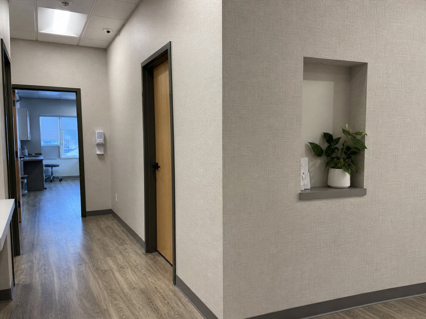 Commercial wallcovering installation in a Calgary corridor
