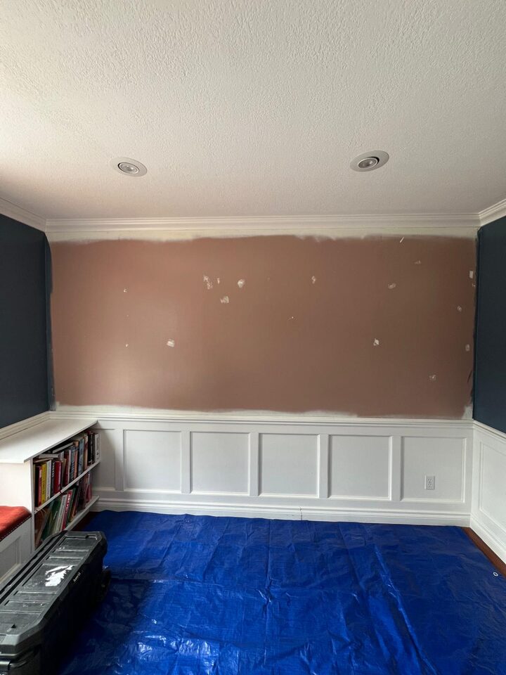 Progress photo of a Deer Run SE Calgary dining room wall after wallpaper removal and before new wallpaper installation