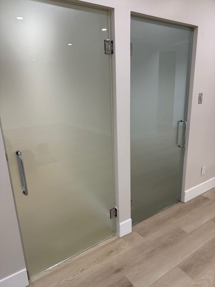 After photo of Dusted Crystal frosted privacy window film on interior office glass doors in Vista Heights NE Calgary