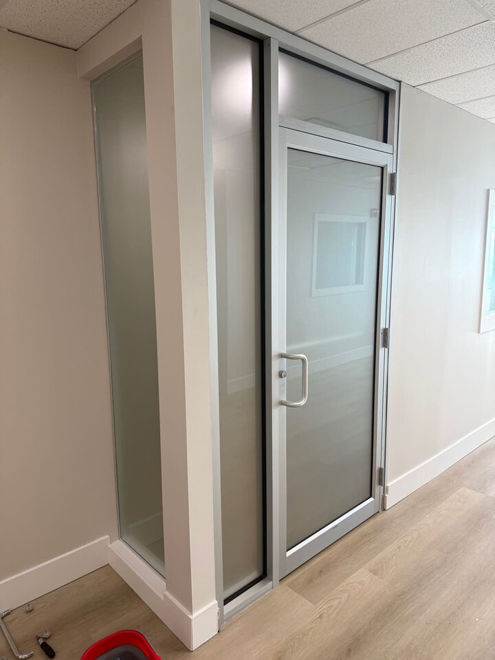 After photo of Dusted Crystal frosted privacy window film on an office glass door and sidelites in Vista Heights NE Calgary