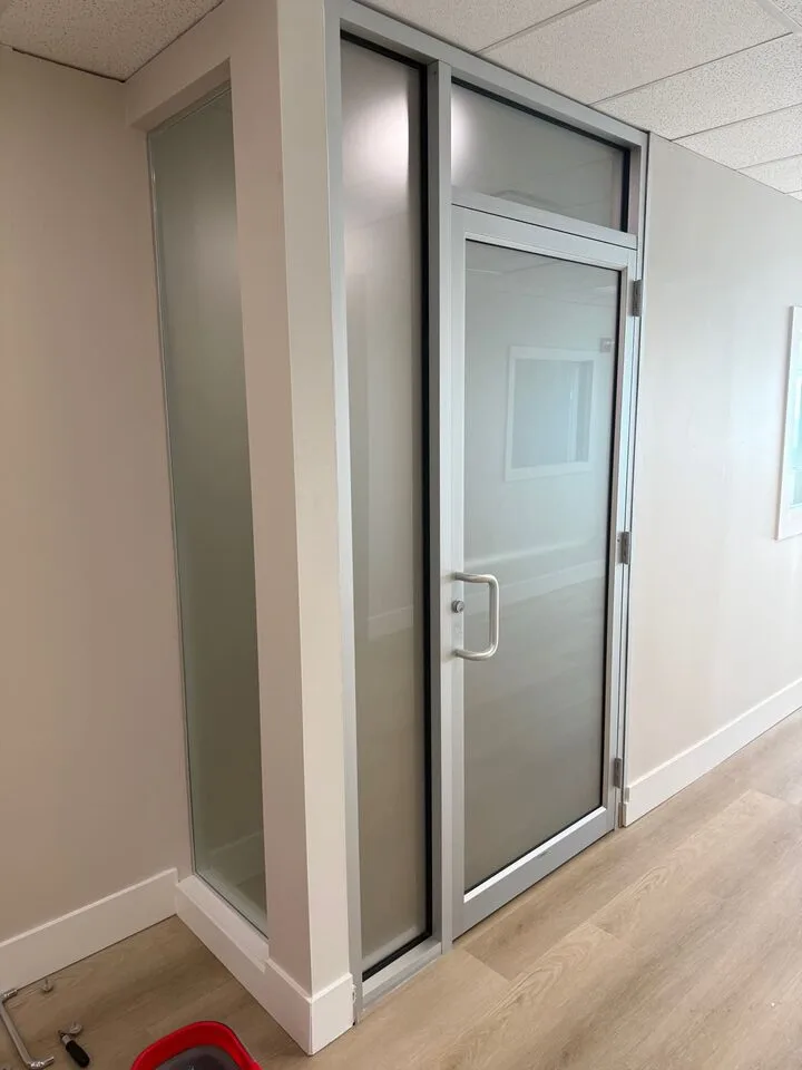 Dusted Crystal frosted privacy window film on an office glass door and sidelites in Vista Heights NE Calgary