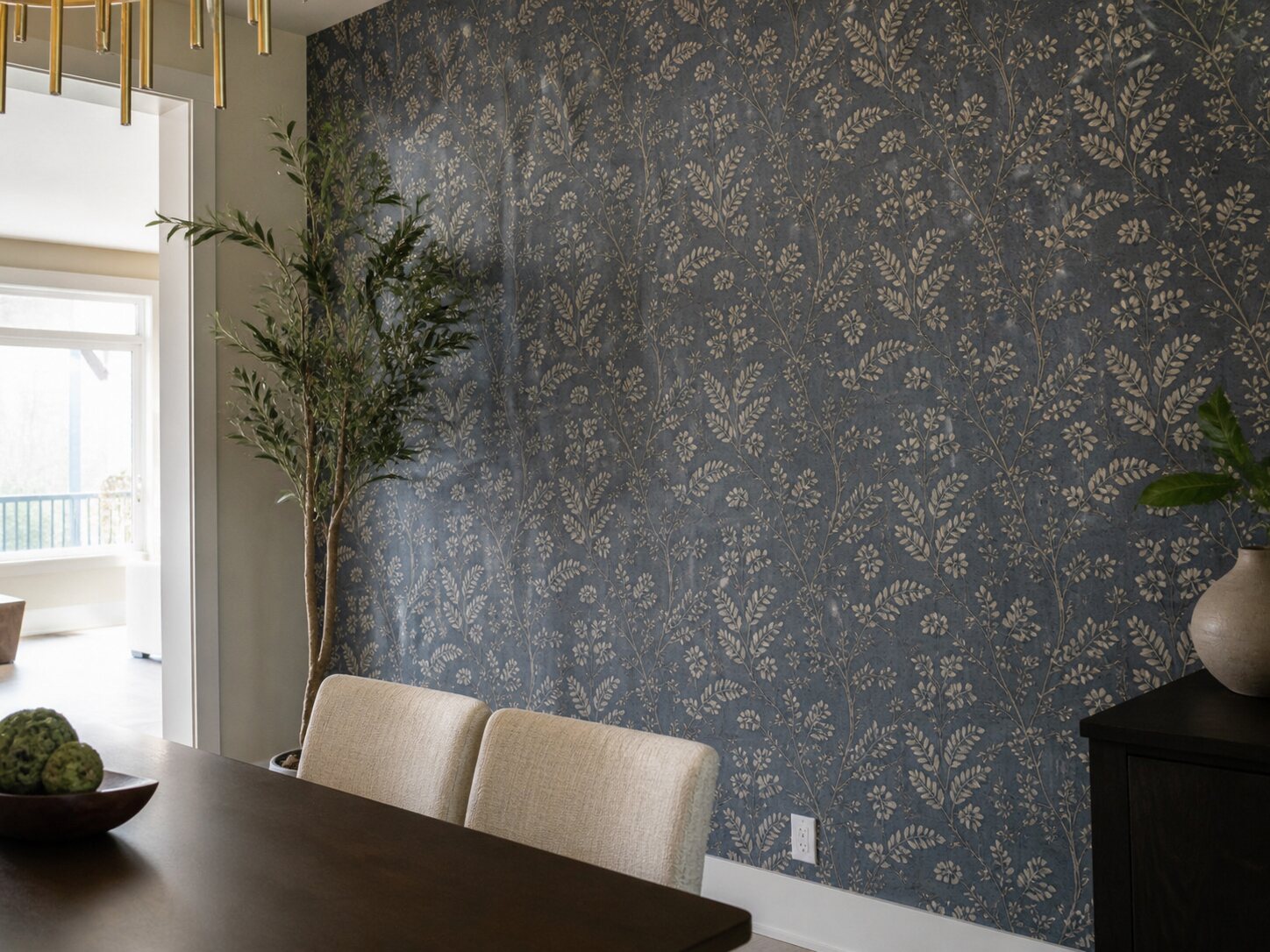 Installed patterned wallpaper in a finished Calgary room